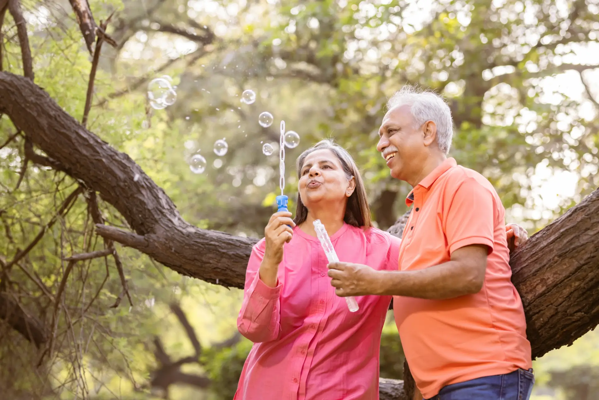 Elderly people enjoying in a garden